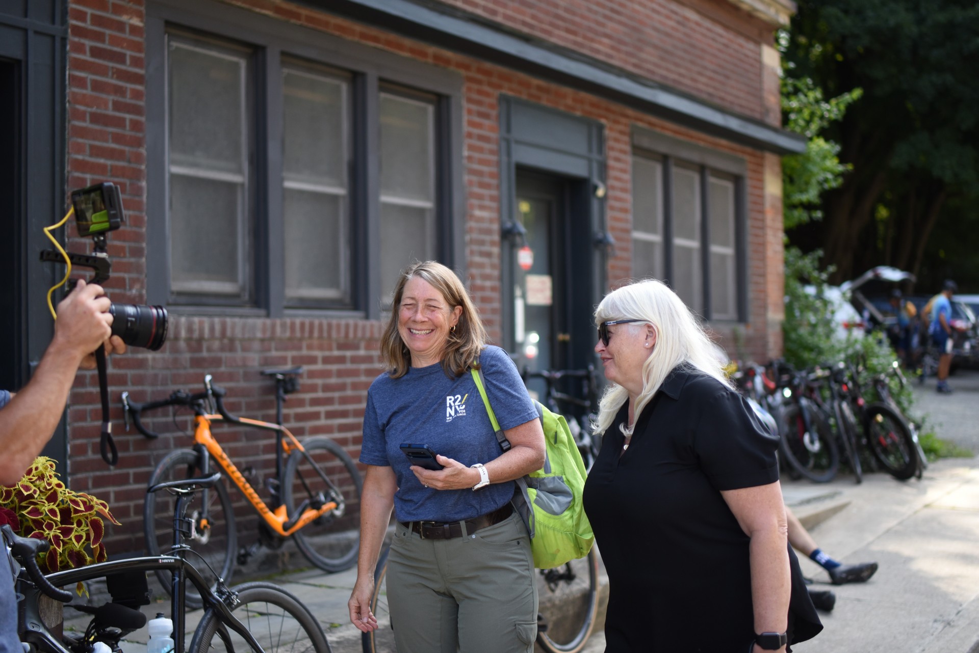 support crew members pictured at a stop along the ride