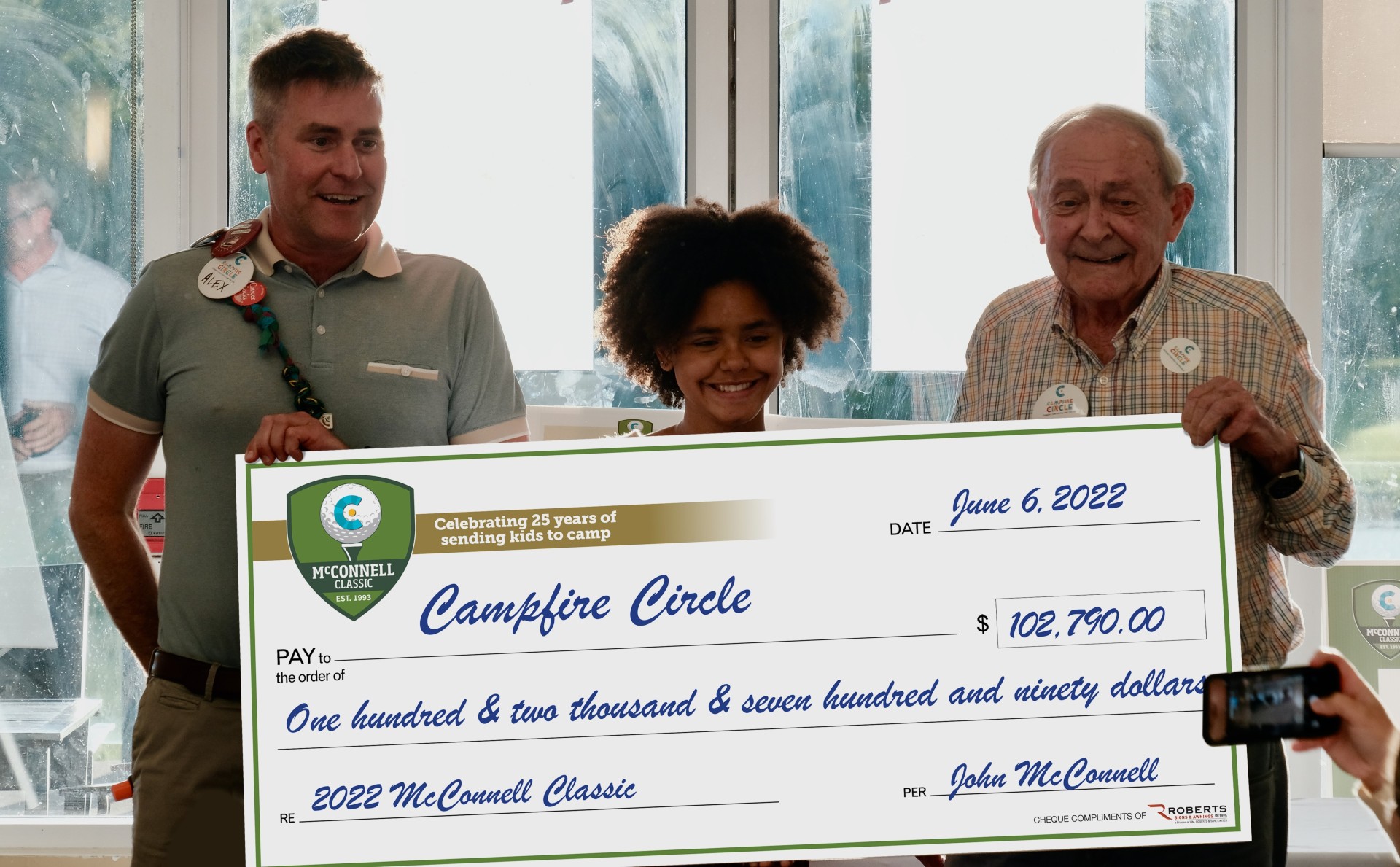 cheque presentation with event organizer