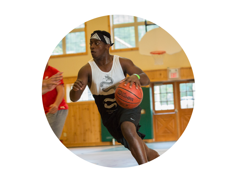 teenager playing basketball